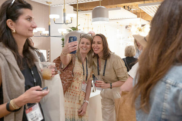 Say cheese! Zoë Feldman (right) poses for a selfie with a smiling attendee