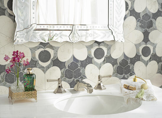 Luca, a waterjet-cut mosaic, shown in honed Basalto Orvieto, Bianco Antico and polished Oyster