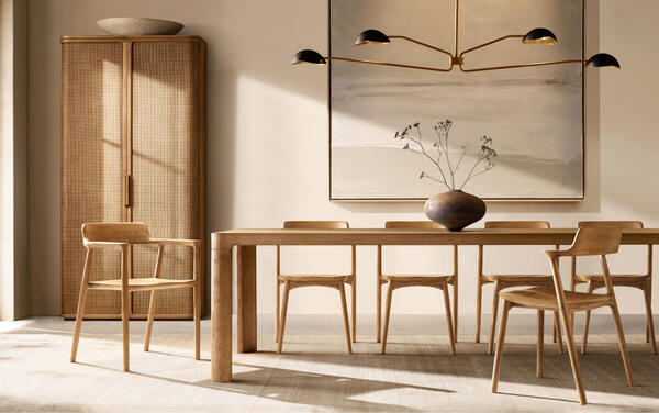 Trieste dining collection in Natural Oak shown with the Oskar dining chair