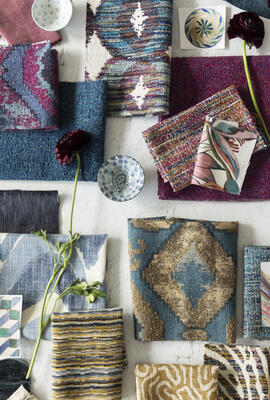 Panorama is a sweeping celebration of textile traditions and techniques, with a focus on texture and rich color. Chunky jacquards, sumptuous velvets, and romantic flora and fauna recall an era of elegant travel and sophisticated sensibilities. The Far Flung color story, pictured here, is a daring pigmented mix featuring lapis blue, vibrant fuchsia and brilliant emerald. It envisions the jet-set bohemian traveler returned home, among their finds, a reflection of their individuality and experience