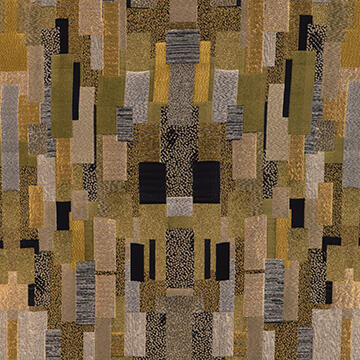 Jacquard weaving transforms gold, silver and black yarns into the multidimensional geometric pattern Gold Standard. The result is both high art and high fashion. Substantial weight and expansive drape encourage dramatic applications