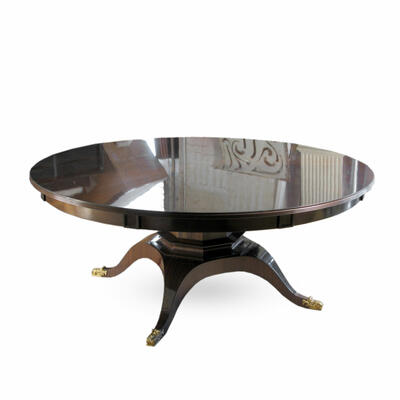Custom version of the Perrault dining table made to expand with radial leaves