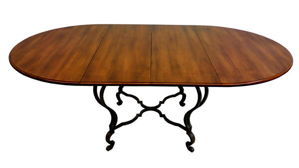 Louis XV–style steel-base table with leaves extended
