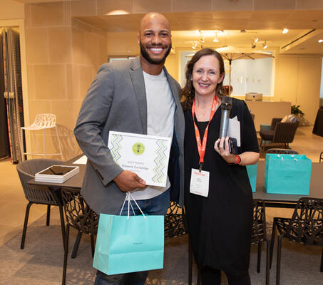 Most Playful Award recipient Emmett Lockridge of Kansas State University with competition judge Jenny Myers of RIOS