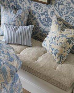 Calathea wallcovering in Blue shown with pillows in Taplow in Capri/Sky and Posy in Sand/Sky