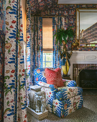 Riviere in Blue on the drapes and Bedford chair, Le Zebre in Red accent pillow