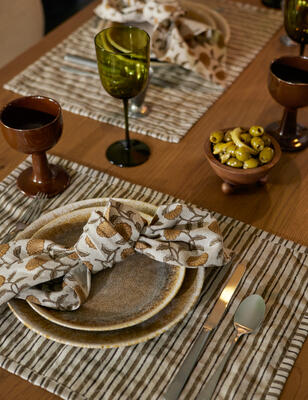 Embellish your table with stylish wares and charming details that make every meal feel inviting