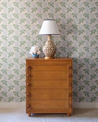 Our popular Button-Down Chest in oak with our best-selling Pheasant Feather Lamp in brown.