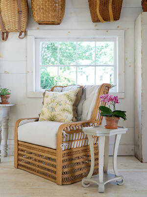 Our wicker Kinley armchair has comfortable tie-on seat cushions