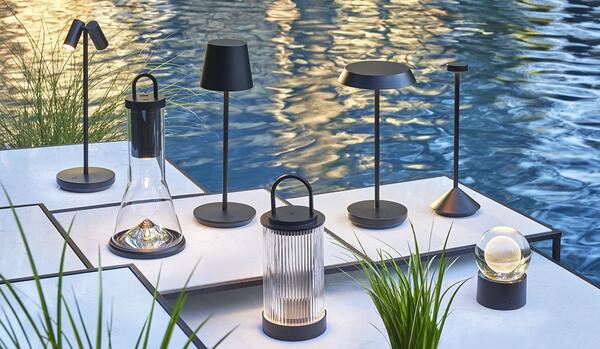 Wet-rated rechargeable lamps from Visual Comfort are ideal for outdoor entertaining