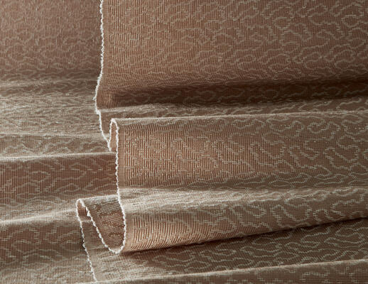 Nephele’s jacquard-handloomed ramie design captures the beauty of ethereal cloud formations