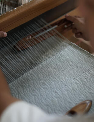 Kyma woven-to-size grassweave windowcovering on the loom