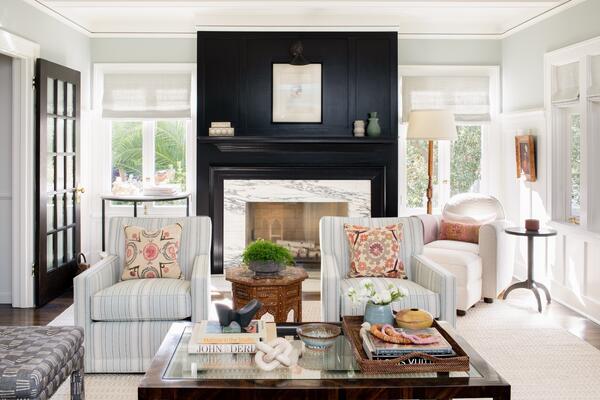 We used Farrow&Ball's "Off Black" to offset the fireplace wall in this classic family living room.