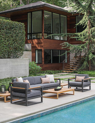 Casita aluminum lounge chairs, sofa and teak side and coffee tables