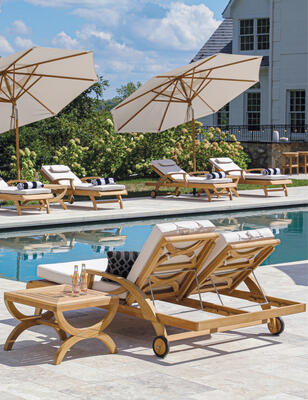 Fiori teak chaises, Fiori teak side table and tilting teak umbrellas