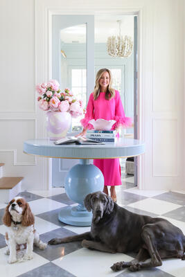 The Derby foyer table features a removable lazy Susan and brass details