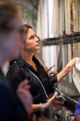 Guest browsing fabrics in the Thibaut showroom