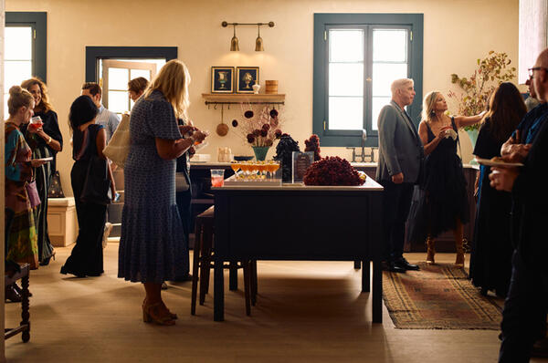 Guests explored and mingled within the three display kitchens.