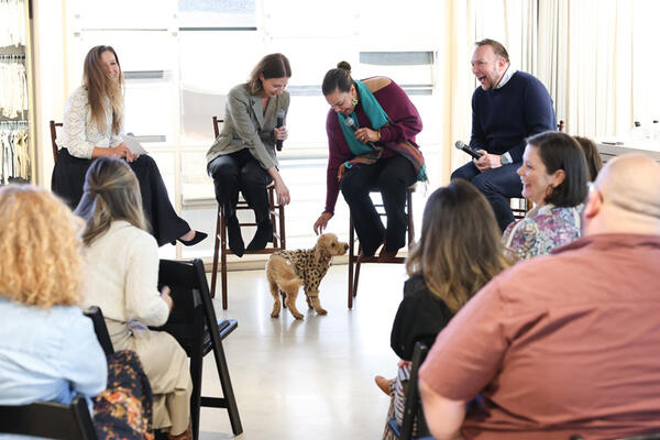 A furry friend joins the panel discussion