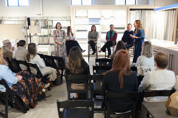 Savannah Amerson and Kara Marmion welcome guests to the showroom