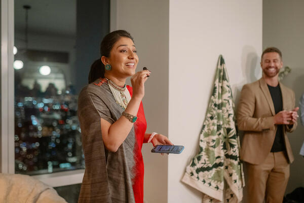 Soni Mehra welcomed guests while Joel Dixon looked on