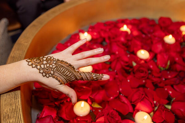 The owner of Poonam Henna Art painted gorgeous designs on the hands of guests during the party.