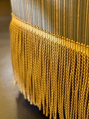 Bullion fringe by Samuel & Sons added flair to the Cabo swivel chairs. (Image courtesy of Bernhardt)