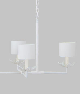 Chalk-white paint gives the Antibes chandelier a fresh finish 