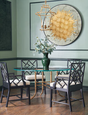 Bask table with glass top, Fretwork dining chairs