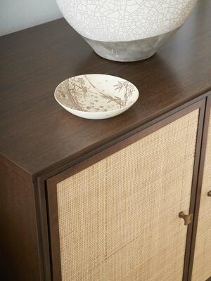 Textures two-door cabinet with cane doors