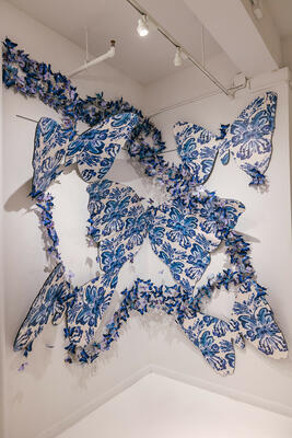 The exhibit featured a butterfly installation incorporating Kravet Couture x Altuzarra’s Rorschach pattern in Murex