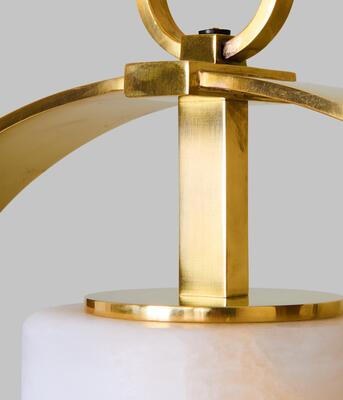 A ring of solid cast brass surrounds a hand-finished alabaster shade in the Langley ceiling light