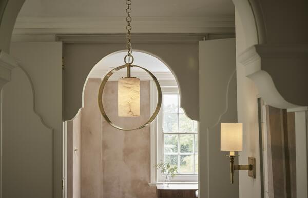 The Candover wall light subtly complements the lines of the Langley ceiling light