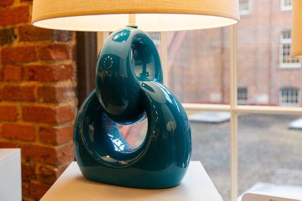 The ceramic Fusion table lamp from Robert Abbey's Custom collection, shown in Peacock