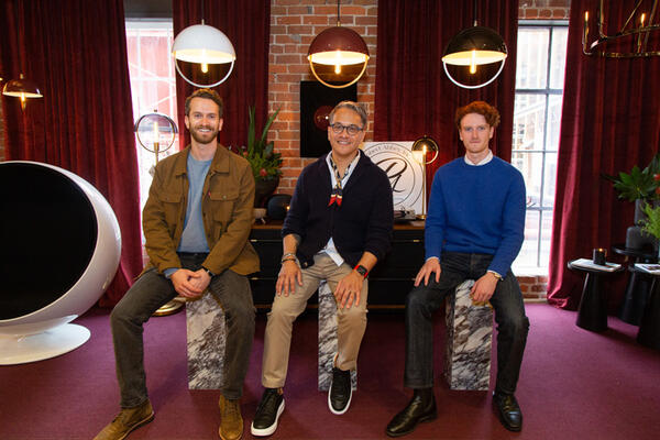 Aaron Levine, Michael Almodova-Sorensen, and Daniel Laffan pose with pieces from the Copernica collection and Carbonia collection by Mavisten Edition from Robert Abbey