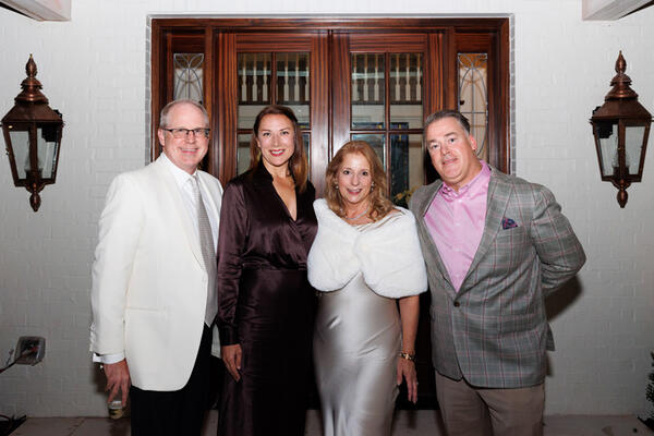 The design-build team for the 2024 Home for the Holidays
Showhouse: Scott Kirk of Kirk Design, Cindy Bray of Floralis Garden Design, Tish Mills Kirk of Tish Mills Interiors
and Michael Clagett of Firelight Homes