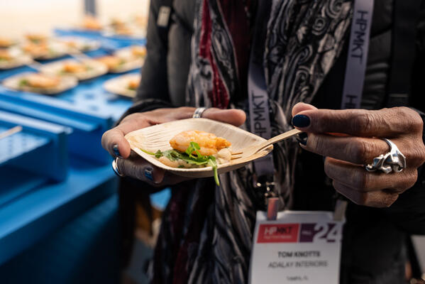 Grilled shrimp with white bean and arugala salad with a dill vinaigrette prepared by chef Justin Cullimore of Signature Kitchen Suite