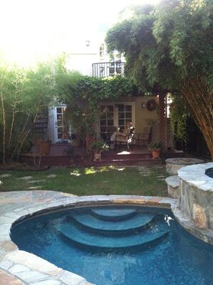 Toluca Lake - Swimming pool / raised spa with Chinese random slate coping & decking

designed by SMJ