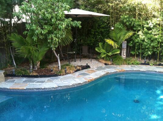 Toluca Lake - Swimming pool / raised spa with Chinese random slate coping & decking

designed by SMJ