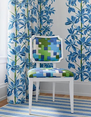 Mangrove Tree wallcovering, Kelby Chair in Pixel, and AREAS rug in Newport
