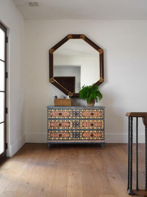 A true work of art, the Friedrich hand-painted chest showcases an array of faux painting techniques
