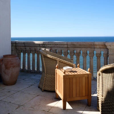 The new outdoor teak drinks table is a nod to the iconic planters of the Versailles Orangerie