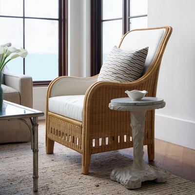 Graceful curves and impeccable craftsmanship define the new Charleston armchair