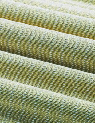Alma evokes the look of a sun-drenched summer beach reimagined in natural bamboo