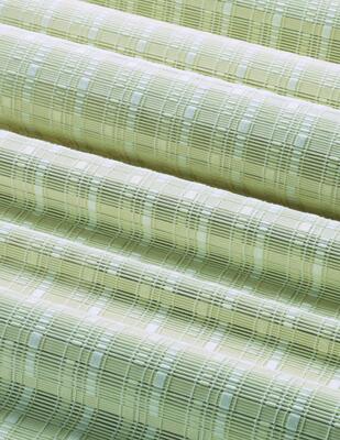Maja is handcrafted of natural bamboo—a modern interpretation of woven wood