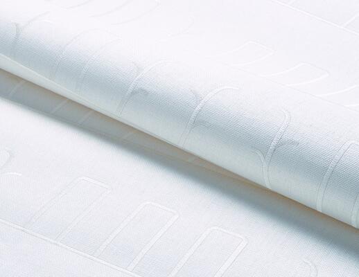 The tone-on-tone embroidered Grace wallcovering is inspired by the 1920s Swedish Grace movement