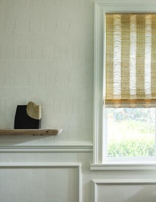 Tove handwoven windowcovering paired with Grace natural wallcovering