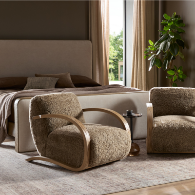 Soft texture and eye-catching contours fuse in the comfort-driven Burke accent chair, which pairs a luxurious shearling seat with a dramatic bentwood frame