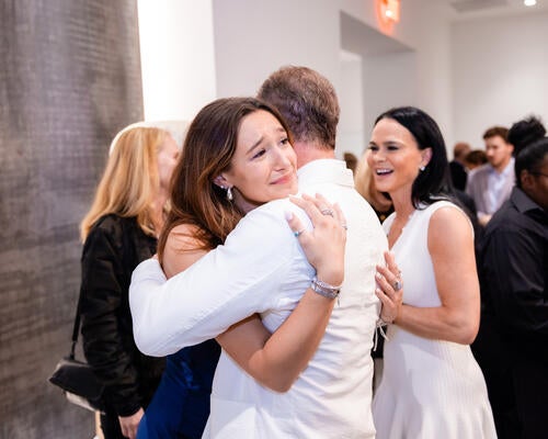 Annabella Bernhardt, who turned 19 the night of the party, shares an embrace with dad Alex Bernhardt Jr.