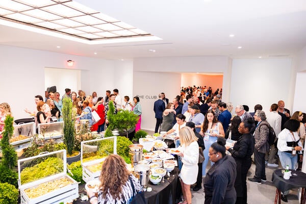 Themed food stations, including an Italian feast, strategically punctuate the second floor